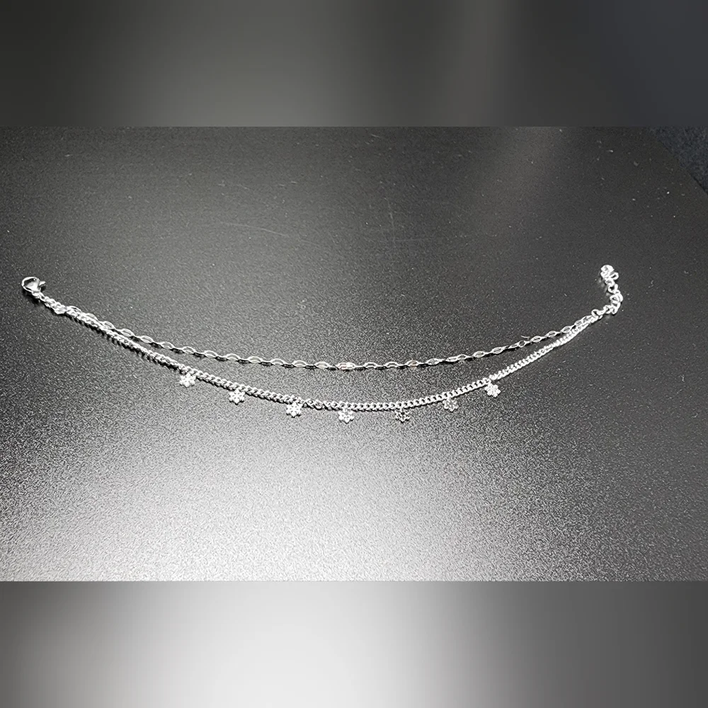 Elegant Silver Foot Bracelet with Floral Accents - Picture 4 of 5